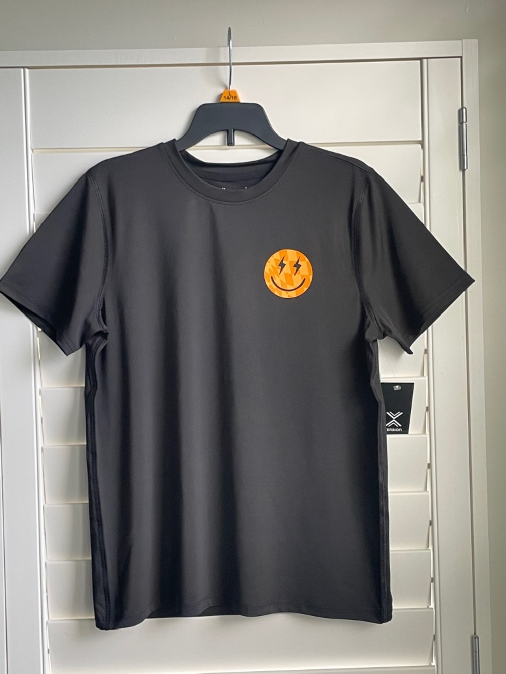 Xersion Boys Black s/s Jersey Tee with Orange Smiley Emblem